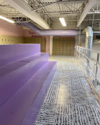 Mezzanine with purple bleachers